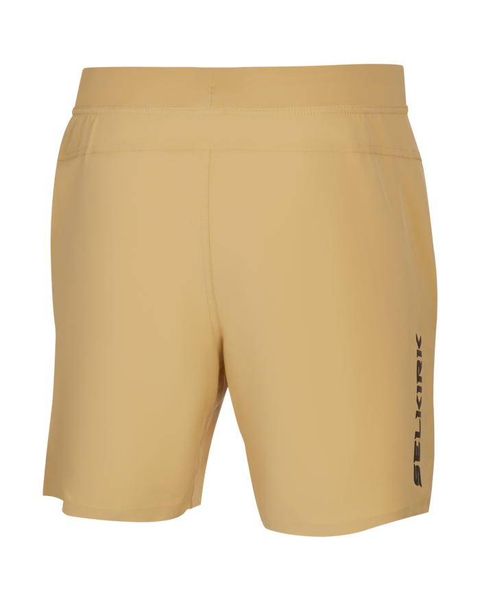 Back view of mustard athletic shorts with vertical 'SELKIRK' logo on right leg.