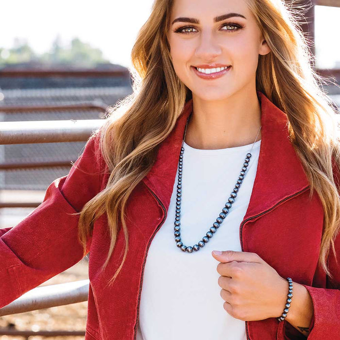 Crafted Navajo pearl bracelet with a adjustable bolo clasp. View on model