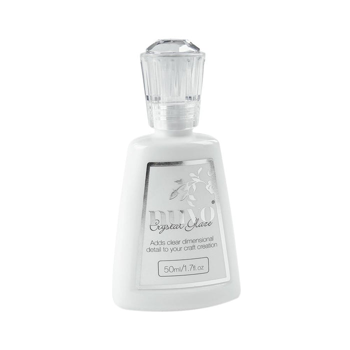 Nuvo-Crystal Glaze. Add clear dimensional detail to your craft creation! This package contains 1.7oz of crystal glaze. Imported. Available at Embellish Away located in Bowmanville Ontario Canada.