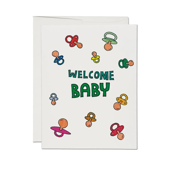 Baby greeting card with pacifier icons and Welcome Baby text