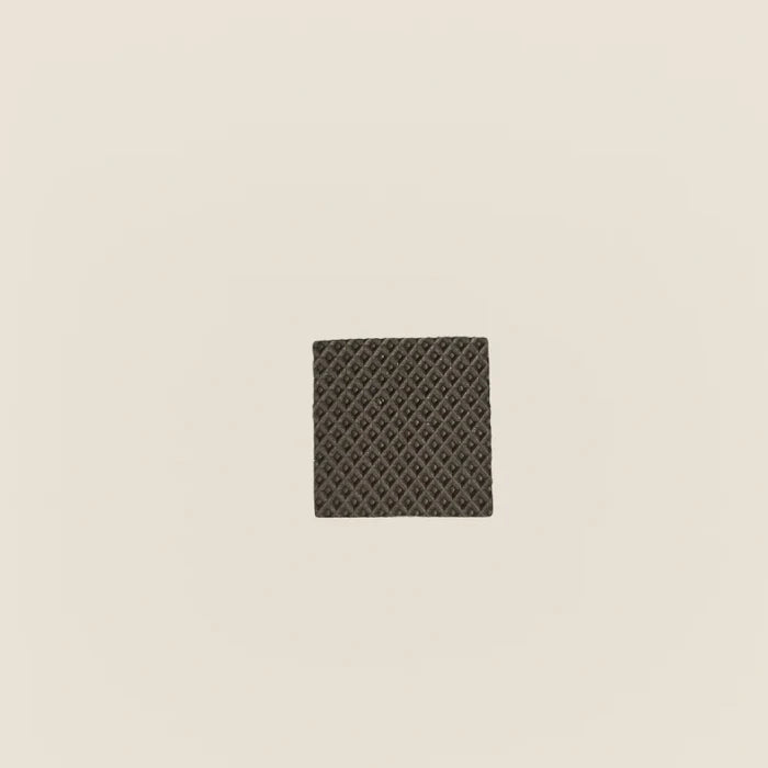 Single textured rubber grip pad for Gratz Pilates equipment feet.