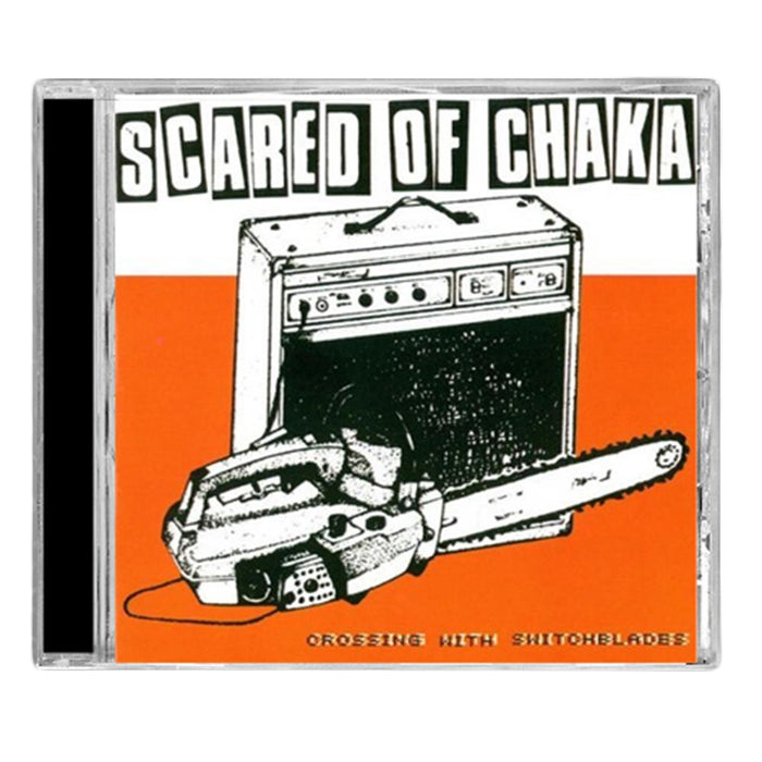 A Scared Of Chaka CD cover shows a black-and-white guitar amp and chainsaw on an orange background, with โSCARED OF CHAKAโ at the top and โCROSSING WITH SWITCHBLADESโ at the bottom. Song titles are printed inside.