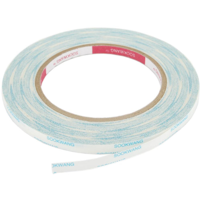Scor-Tape - .25"X27yd. Premium double-sided adhesive that is perfect for cards, boxes, glitter, embossing, scrapbooking, foils, ribbon, origami, iris folding, micro beads, and much more! This tape is acid free and heat resistant. Available at Embellish Away located in Bowmanville Ontario Canada.