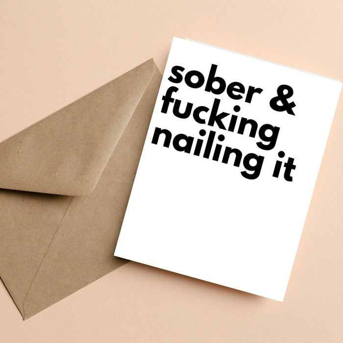 Greeting card: "Sober & fucking hailing it" bold black text on white