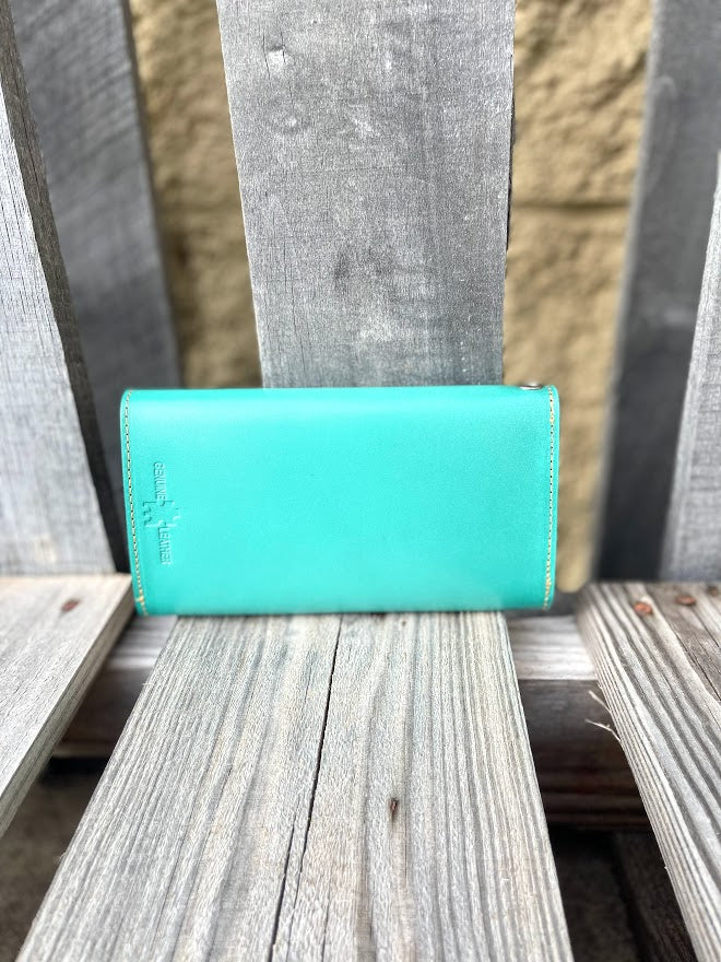 Turquoise Basketweave leather phone case wallet with wristlet strap. Rear view showing smooth leather.