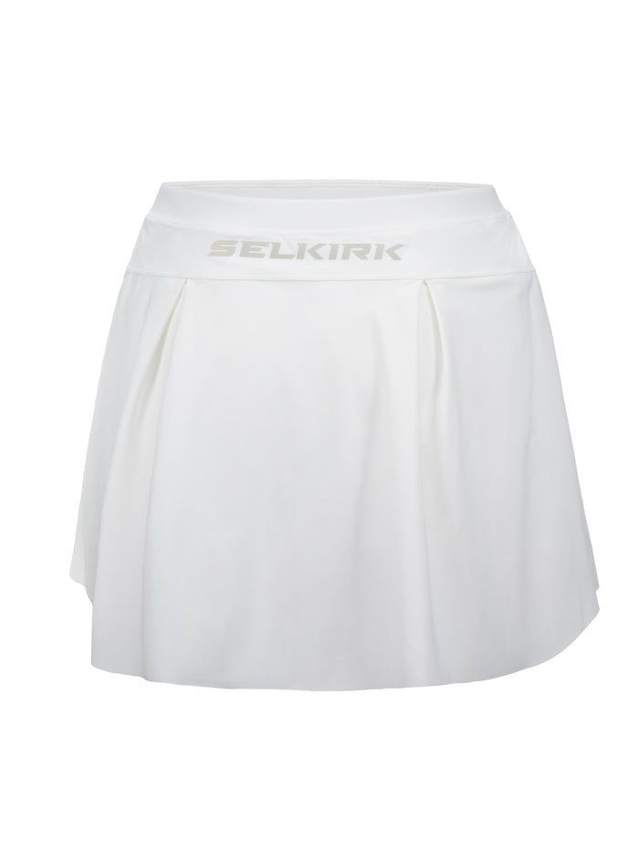 White pleated tennis skirt with SELKIRK logo centered on the waistband