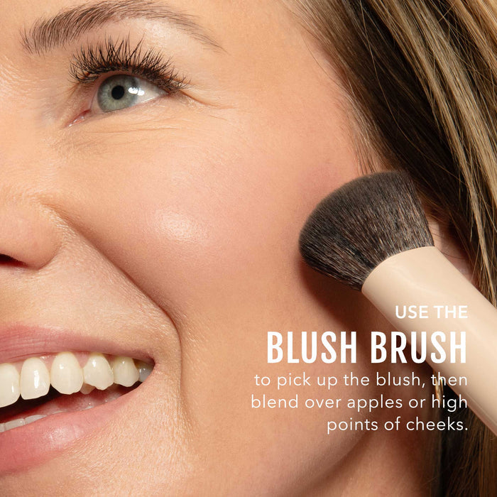 No Makeup Makeup โ Woman applying pink blush & lip color with a brush, close-up of face, natural minimal makeup