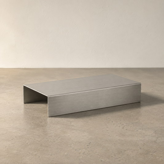 Wide rectangular stainless steel display riser with two folded legs.