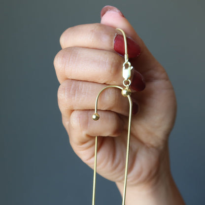 showing a sliding knot of Adjustable Snake 14 Karat Gold on Sterling Silver chain