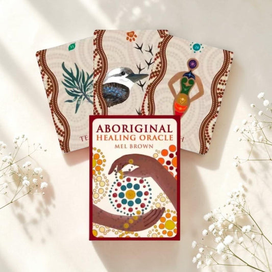Aboriginal Healing Oracle card set with cover on a light background