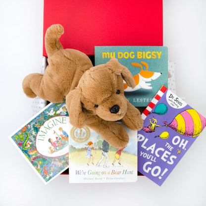 A collection of children's books and a plush toy dog presented in a red gift box. 

Price: 125