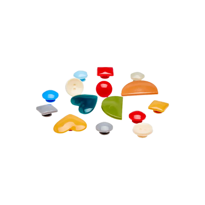 Assorted colorful decorative shoe charms and replacement plugs for customizing white air clog shoes