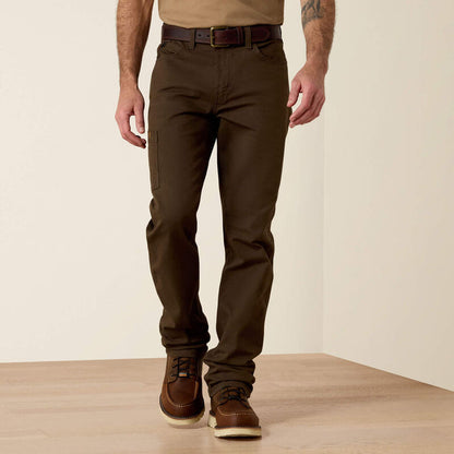 Men's Ariat wren brown Rebar pants with scoop front pockets and a right coin pocket that has an angled Ariat logo fabric strip for reinforcement. Also shows right thigh utility pocket. Front  view.