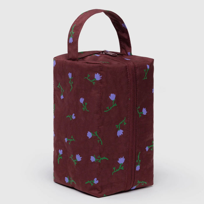 Brown bag with floral patterns on a white background