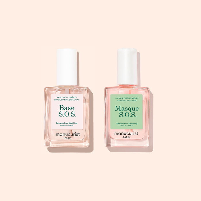 Two bottles from Manucurist’s Basic Routine - Damaged Nails set are placed side by side on a light beige background—an ideal duo designed for nail repair and strengthening brittle nails.