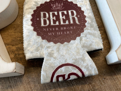 Beer Never Broke My Heart can cooler