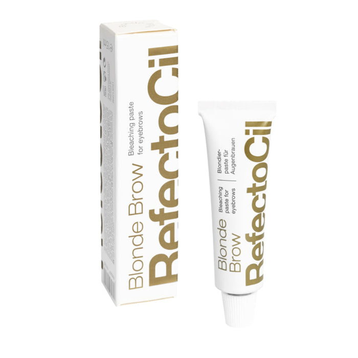 A tube of RefectoCil Blonde Brow bleaching paste for eyebrows, with the product packaging behind it.
