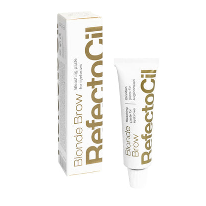 A tube of RefectoCil Blonde Brow bleaching paste for eyebrows, with the product packaging behind it.