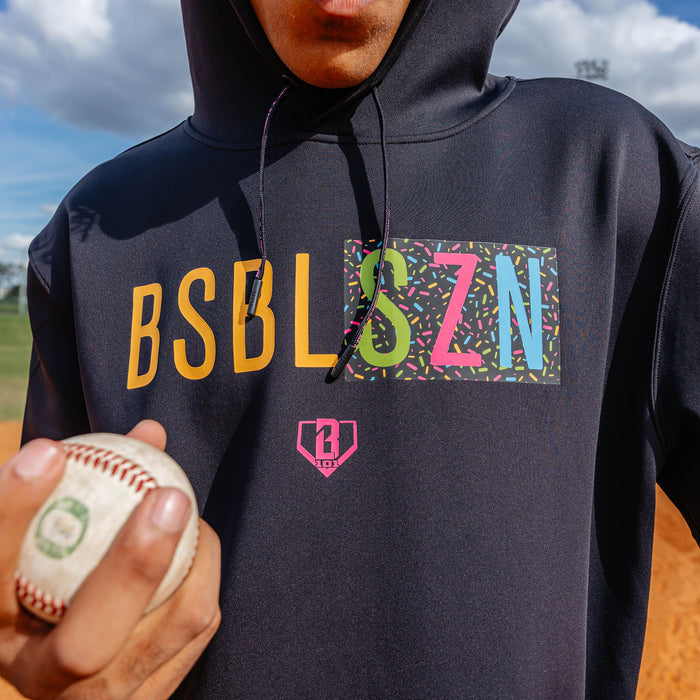 Youth model wearing black and midnight sundae BSBL-SZN youth short sleeve hoodie