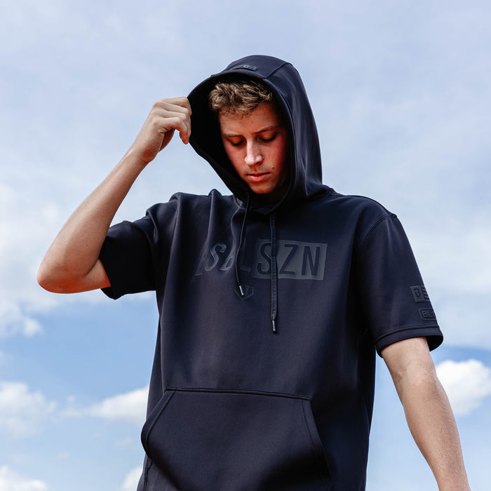 Youth model wearing black BSBL-SZN Blackout youth short sleeve hoodie