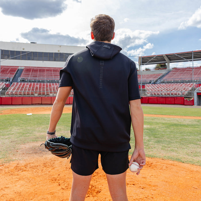 Youth model wearing black BSBL-SZN Blackout youth short sleeve hoodie