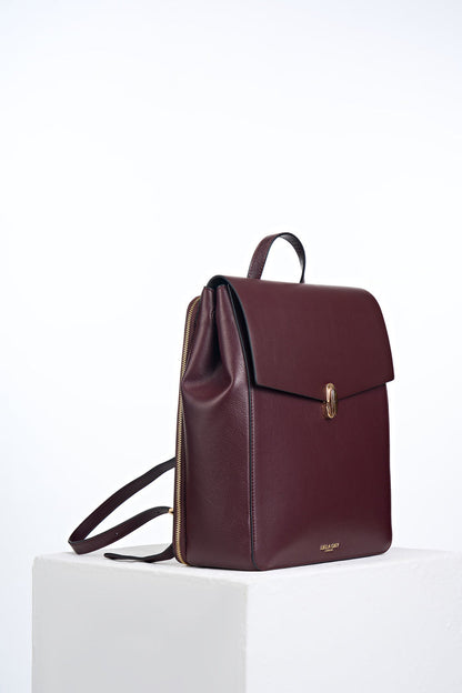 Side view of Casey Black Cherry faux leather Laptop Backpack