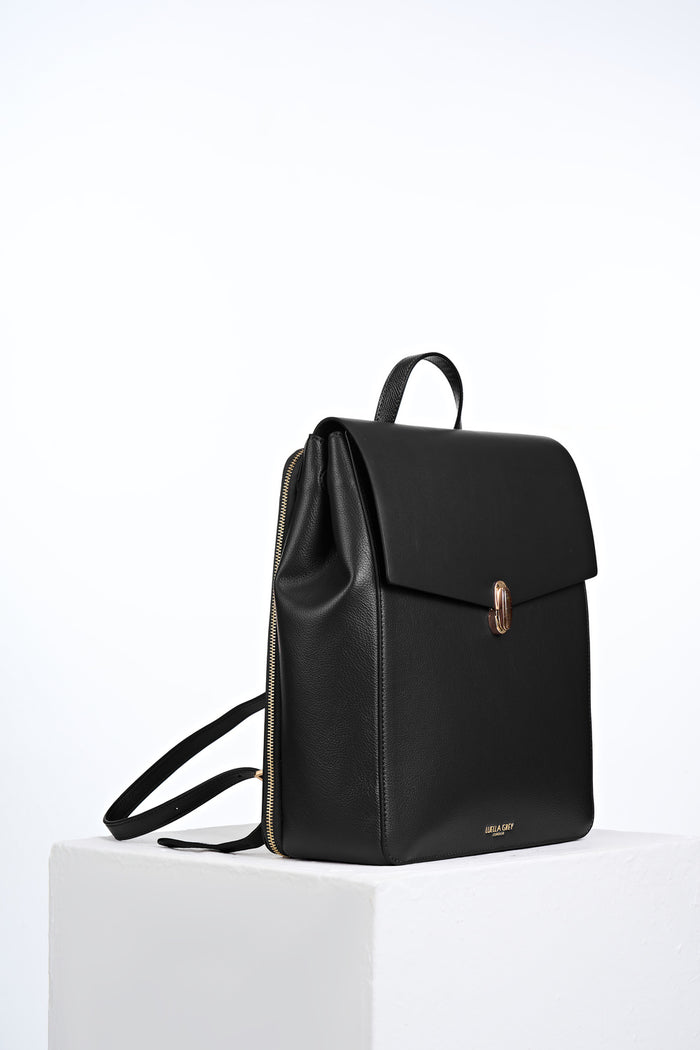 Side view of Casey Black faux leather Laptop Backpack