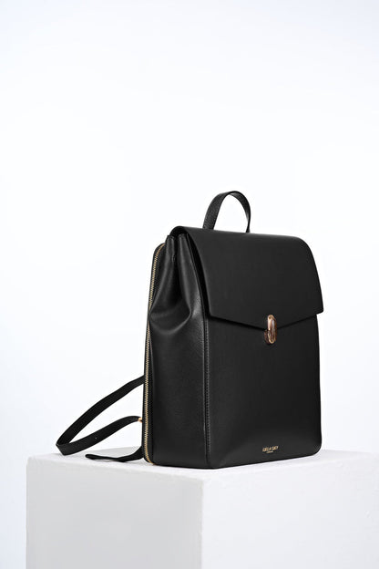 Side view of Casey Black faux leather Laptop Backpack