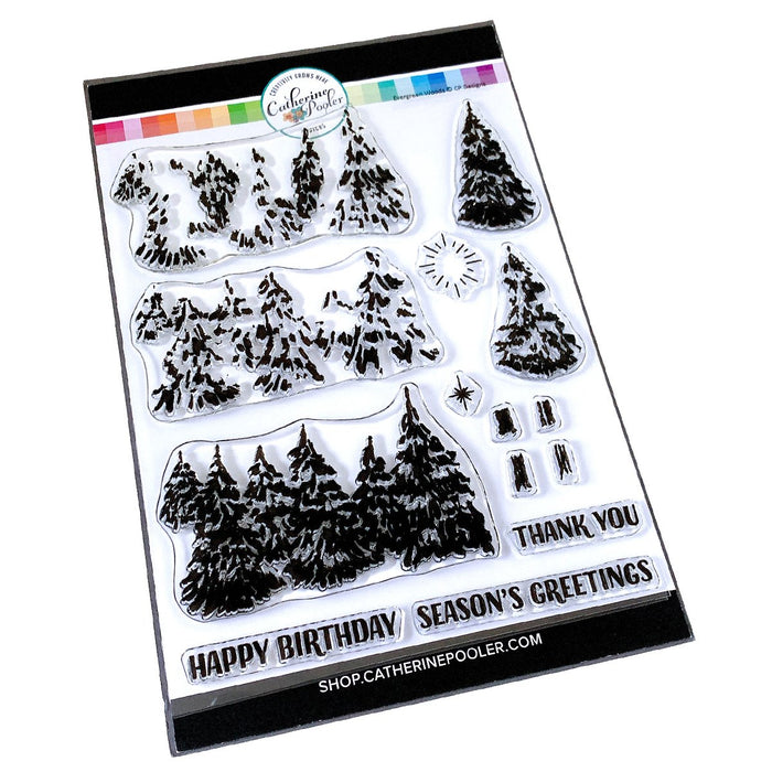 Catherine Pooler - Stamps - Evergreen Woods. Create your own Evergreen Woods with our 6x8 layering stamp set and coordinating Evergreen Woods Dies. This set contains multi-step stamps to "build" a forest of pine trees or an individual tree. The addition of the North Star stamp will bring added warmth to your winter scene or even make a nice holiday tree topper. Available at Embellish Away located in Bowmanville Ontario Canada.