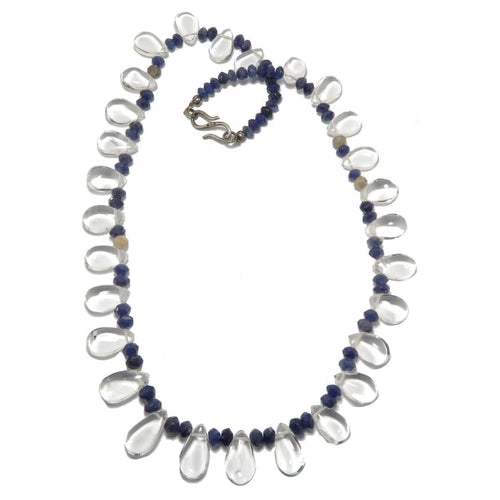 A clear quartz and blue aventurine necklace with a silver clasp.