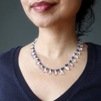 A clear quartz and blue aventurine necklace with a silver clasp.