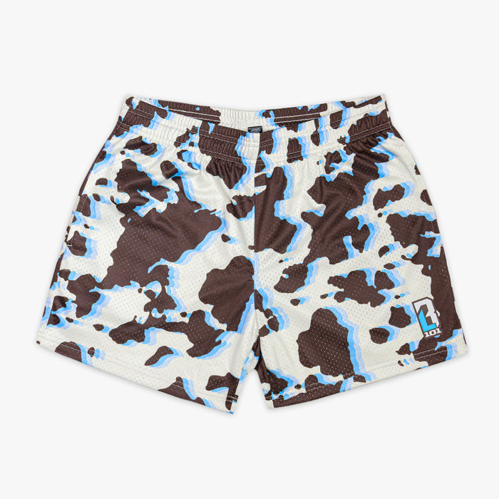 Cow print shorts with brown, black, and blue color way on a white background