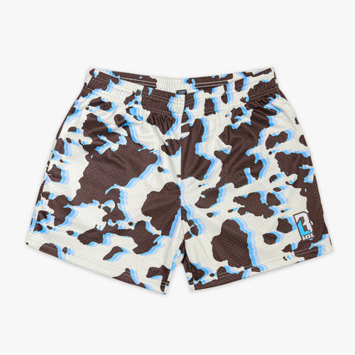 Cow print shorts with brown, black, and blue color way on a white background