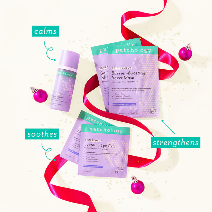 Lavender calming micro mist, barrier-boosting sheet masks, and soothing eye gels labeled "calms," "strengthens," and "soothes," with red ribbon and ornaments