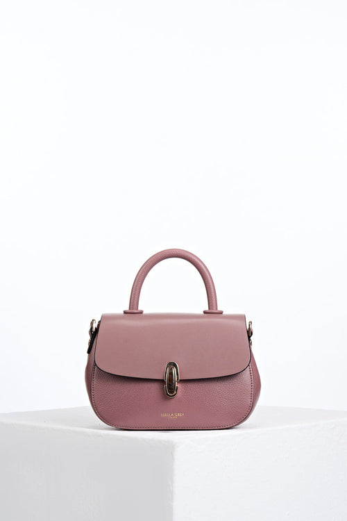 Front of Delia Pecan faux leather Top Handle Crossbody without detatchable crossbody strap showing resin Waterloo twist lock clasp closure detail
