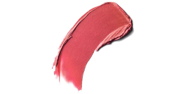 Swatch of sheer matte pink lipstick on white background, makeup beauty product