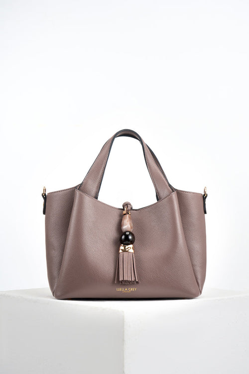 Front of Etta Fawn faux leather Small Tote with resin and molten gold Signature Mayfair Tassel charm closure