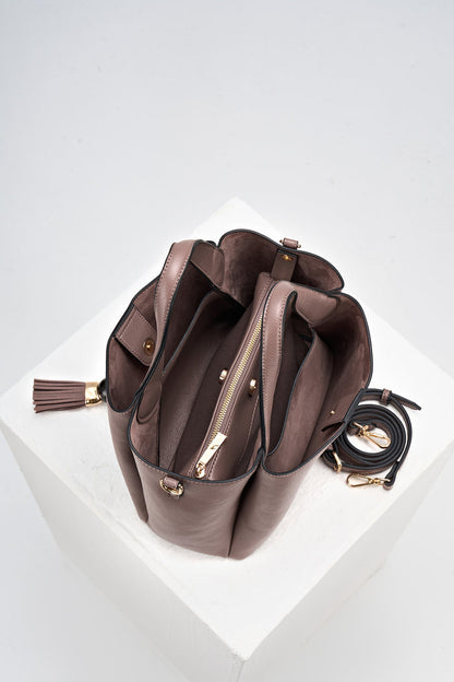Overhead view of Etta Fawn faux leather Small Tote showing the inside and removable interior pouch with detachable crossbody strap rolled up next to the bag