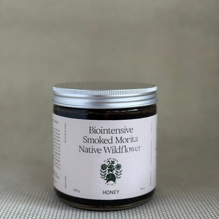 Jar of Biointensive Smoked Morita Native Wildflower honey by Flamingo estate, Santa Monica. Los Angeles