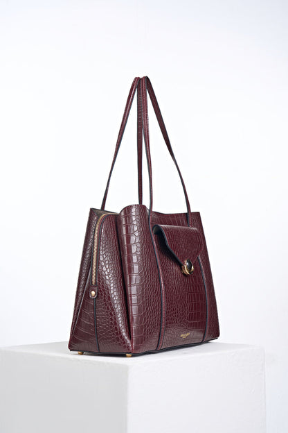 Side view of Francois Black Cherry Crocodile print faux leather Laptop Tote showing central zipper laptop compartment