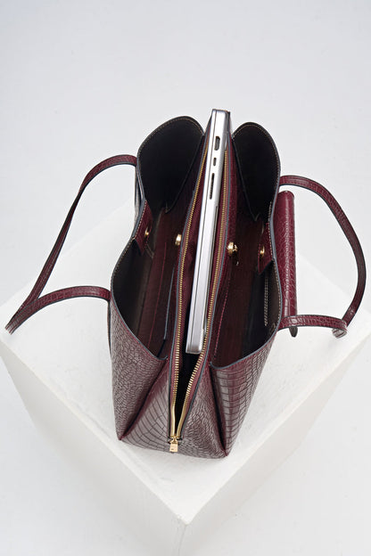 Overhead view of Francois Black Cherry Crocodile print faux leather Laptop Tote showing inside compartments and central laptop zipper compartment