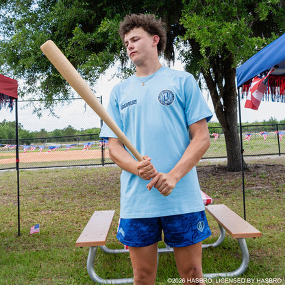 Adult model wearing blue shorts with “G.I. Joe Star” design