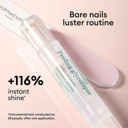 A close-up of the Manucurist Prep  Glow Routine nail care pen with a pink file on beige background. Text: Bare nails luster routine, part of the ultimate glossy nail care, +116% instant shine (instrumental test).