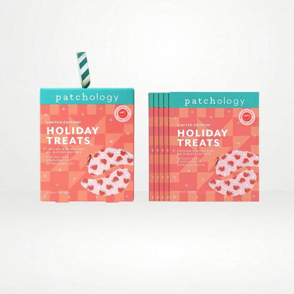 Holiday chocolate mug eye masks packaging on a clean white background, showing a single box with a striped straw and a stack of matching boxes.