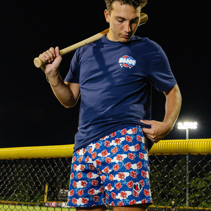 Adult model wearing red, white & blue Home Run Sugar USA shorts