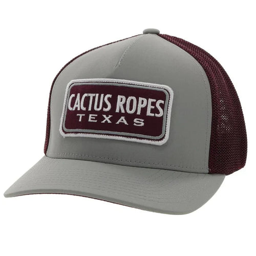 Hooey Gray and maroon trucker hat with 'Cactus Ropes Texas' patch. Front view stock photo.