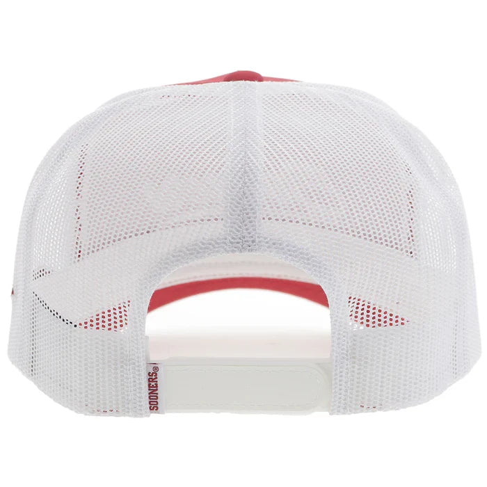 Crimson and white Snapback cap with Sooners embroidered on front with a white mesh back and Hooey logo embroidered on side. Rear view stock photo showing white mesh back, white snapback and small Sooners tag on side of snapback.