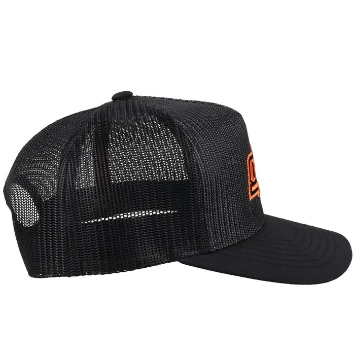 Oklahoma State University Hooey snapback trucker cap. Solid black, mesh back with OSU embroidery. Side view stock photo