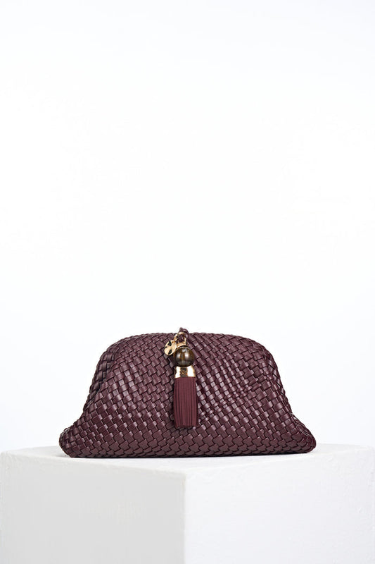 Front of Indigo Black Cherry woven faux leather Oversized Clutch showing the Signature Thames Tassel closure detail