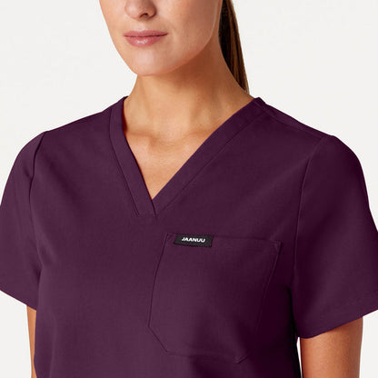 JAANUU Rhena Essential 1 pocket Scrub Top Deep Eggplant - Get Scrubbed